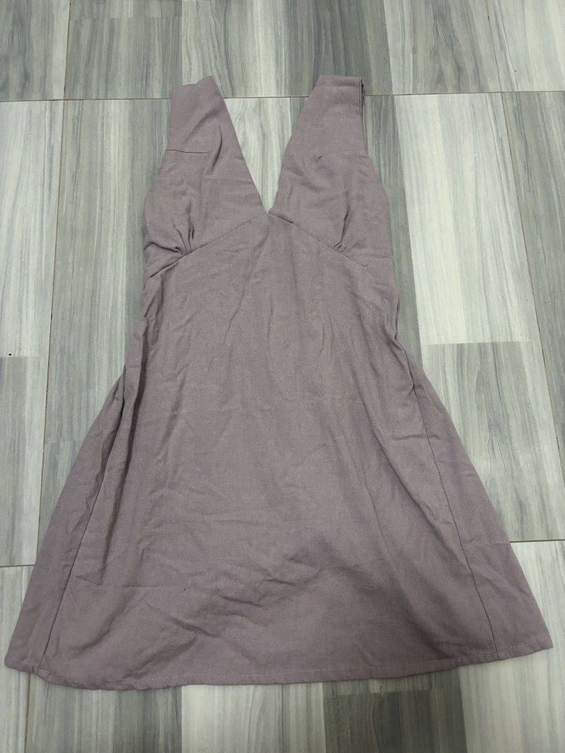 Smocked V-Neck Mini Dress (Category: Dresses) located in Manila. Submitted by lovedbynabix (Listing ID 1461446074, Image 1). Description: Cute purple mini dress. Has a smocked bodice with a V-neckline. Straps are gathered. Great for casual wear or dressing up..