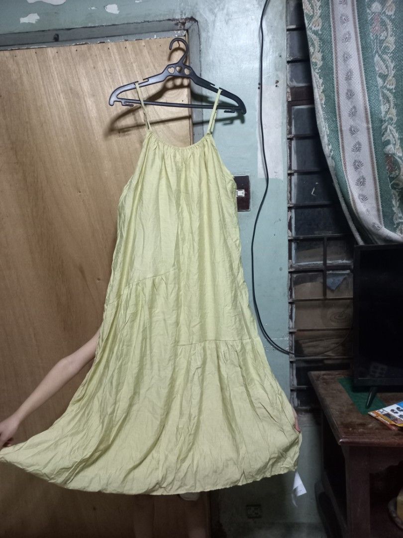 SOMILADY STUDIO Yellow Maxi Dress (Category: Dresses) located in Quezon City. Submitted by msdcshop (Listing ID 1461447763, Image 2). Description: - Yellow maxi dress from SOMILADY STUDIO - Features a crinkled texture fabric - Simple spaghetti strap design - Ideal for casual wear or beach days - Easy to style and versatile.