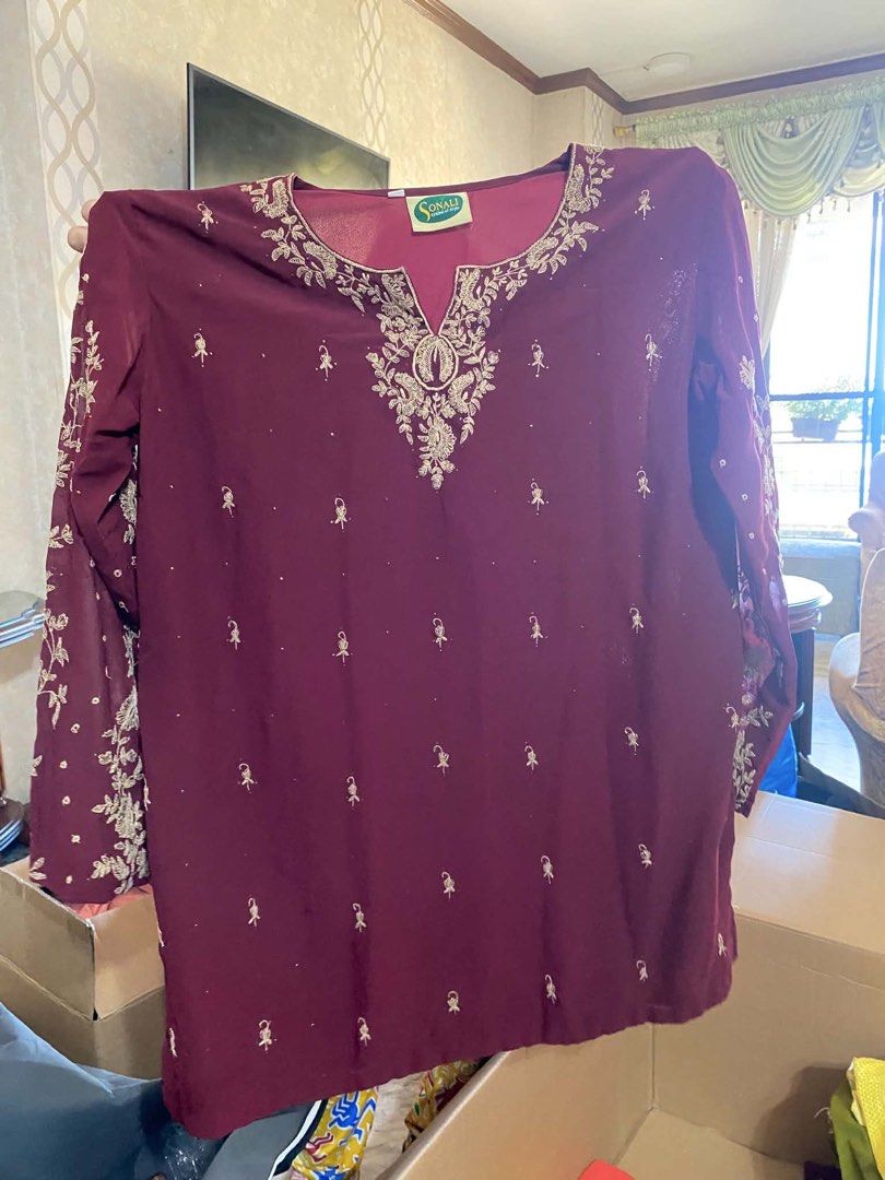 Sonali Kurti - Maroon with Gold Embroidery (Category: Dresses) located in Makati City. Submitted by products_on_a_budget (Listing ID 1461489971, Image 1). Description: - Brand: Sonali - Color: Maroon - Design: Intricate gold embroidery on neckline and sleeves, scattered gold motifs - Sleeves: Long - Occasion: Festive or casual wear.