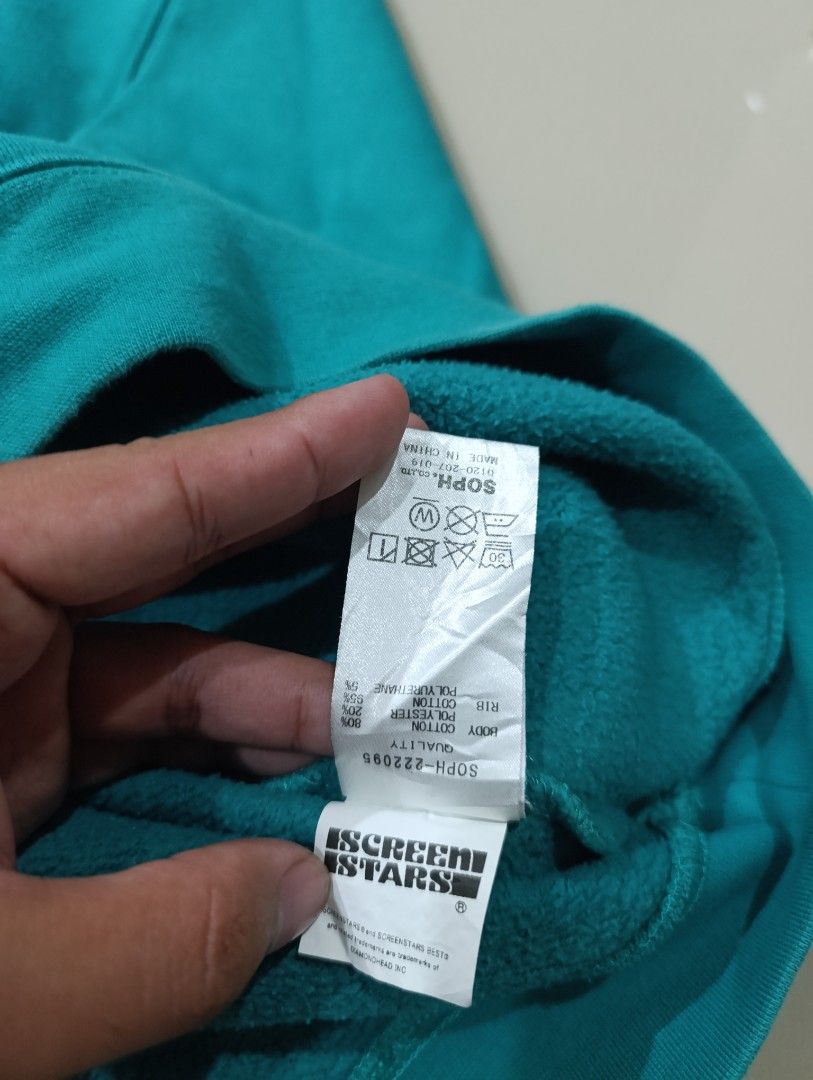 SOPHNET. Screen Stars Sweatshirt Teal Size L (Category: Coats, Jackets and Outerwear) located in Davao. Submitted by idioticthrifter (Listing ID 1461545481, Image 3). Description: - Teal sweatshirt from SOPHNET. and Screen Stars - Features a small embroidered logo on the chest - Made in China - Ribbed cuffs and hem for a comfortable fit - Perfect for casual everyday wear - Refer to label for specific care instructions - issue neck fading -24 x 28