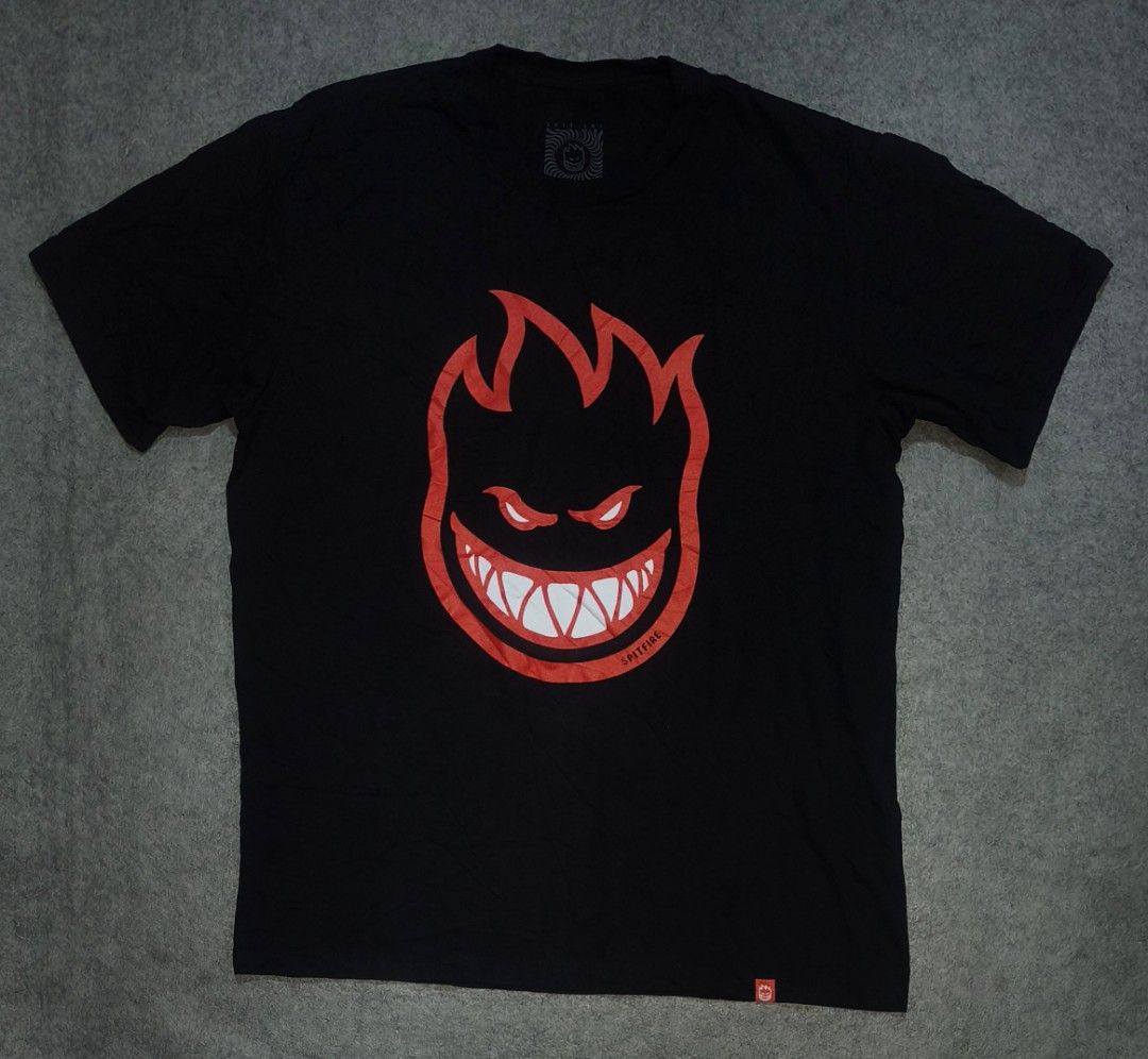 Spitfire Bighead T-Shirt Black Red (Category: Tshirts & Polo Shirts ) located in Cagayan de Oro. Submitted by adamfitz (Listing ID 1461480062, Image 1). Description: - Brand: Spitfire - Design: Bighead logo - Color: Black with red logo - Material: 100% Cotton - Size: Medium (M) - Ideal for: Skating, casual wear large fitting 21x28 like new no issues payment: Gcash, maribank & LBP courier: J&T color may vary due to lightning items are thrifted, li