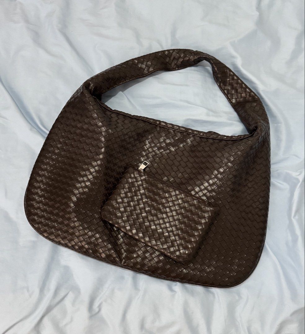 SRUTER Woven Shoulder Bag with Pouch (Category: Shoulder Bags) located in Makati City. Submitted by the.archives (Listing ID 1461446926, Image 2). Description: - Dark brown woven shoulder bag - Includes a matching small pouch - Zipper closure at the top - Interior zippered pocket and two slip pockets - SRUTER logo visible inside - Ideal for everyday use 🗓️ Weekdays: can arrange pickup from SM Podium, Mandaluyong City 🗓️ Weekends: can arrange pi