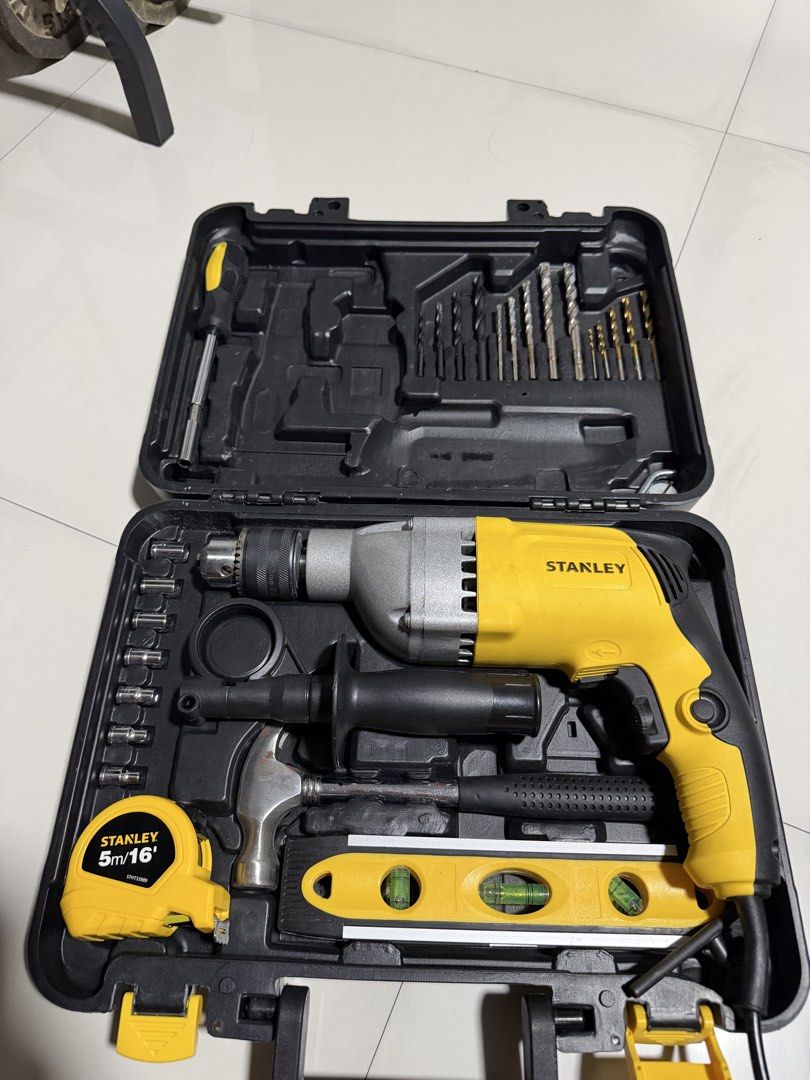 Stanley 800W 13mm Impact Drill Value Pack with Accessories (Category: Construction Tools & Equipment) located in Pasig City. Submitted by prelovedraphxsell (Listing ID 1461466155, Image 2). Description: - Stanley 800W 13mm Impact Drill - Includes 40-piece accessory value pack - Accessories: drill bits, hammer, tape measure, and, level - Comes in a durable carrying case - Ideal for home DIY projects.