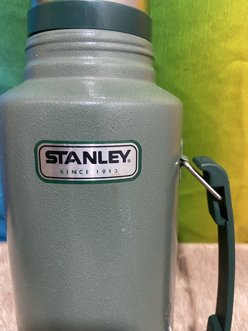 stanley thermos (Category: Water Bottles & Tumblers) located in Pasig City. Submitted by jie_russ (Listing ID 1461419863, Image 2). Description: - Brand: Stanley - Type: Thermos - Color: Classic Green - Material: Durable construction for long-lasting use - Functionality: Keeps beverages hot or cold - Ideal for: Daily use, travel, outdoor activities.
