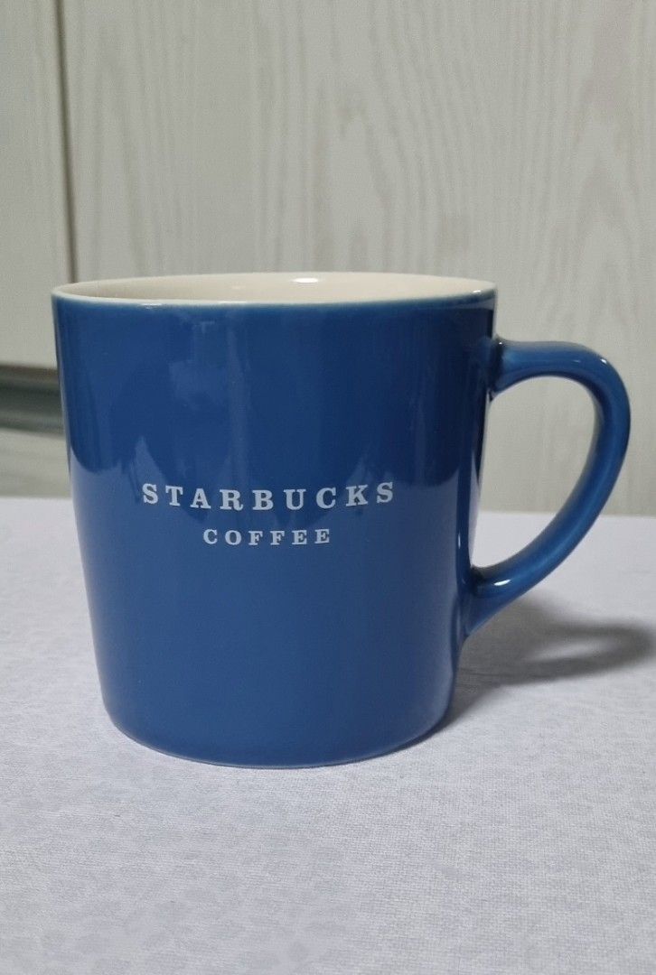 Starbucks Coffee Cobalt Blue Ceramic Mug c (Category: Coffee & Tea Tableware) located in Manila. Submitted by ags028705 (Listing ID 1461561287, Image 1). Description: - Classic blue Starbucks coffee mug - Simple and clean design - Ideal for morning coffee or tea - Generous capacity - Suitable for home or office - A great addition to any mug collection.