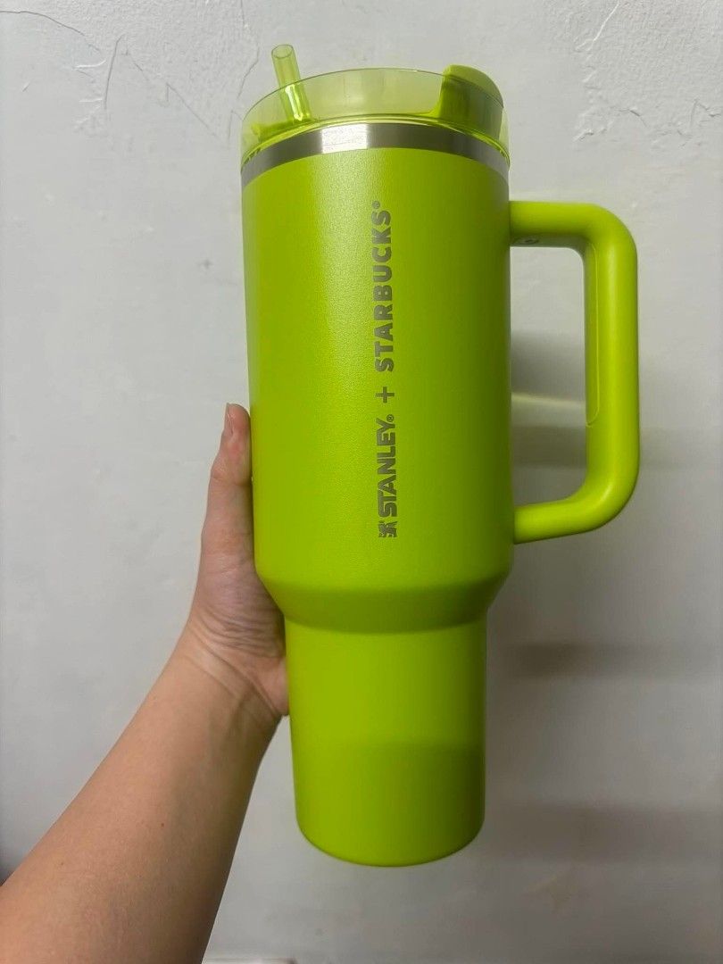 Starbucks collection (Category: Other Food & Drinks) located in Ibaan. Submitted by ljnaig14 (Listing ID 1461366588, Image 1). Description: Starbucks x Stanley 40oz Adventure Quencher Travel Tumbler from the limited-edition "Color Pop" summer collection. [ Key Details: Color Way: Lime Green / reusable straw Features: It is constructed with double-wall vacuum insulated stainless steel, an ergonomic comfort-grip side handle, a 3-position screw-on l