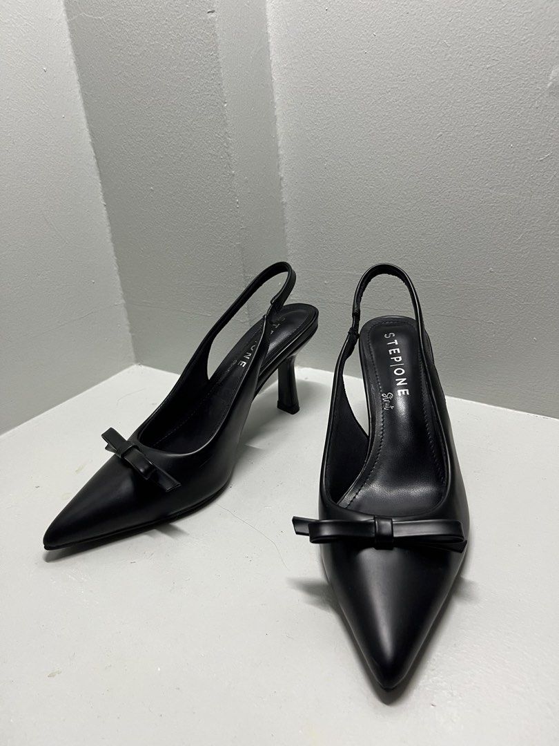 STEP ONE Black Slingback Heels with Bow Detail (Category: Heels) located in Caloocan City. Submitted by preownedco. (Listing ID 1461534389, Image 3). Description: - Brand: STEP ONE Payless - Style: Black Slingback Heels - Toe: Pointed - Detail: Cute bow at the front - Fit: Elastic strap at the back for security - Versatility: Perfect for work or casual outfits Price: Negotiable .