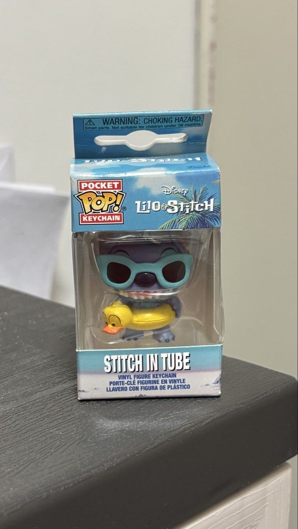 Stitch funko pop keychain (Category: Designer & Blind Box Toys) located in Imus. Submitted by alexthings (Listing ID 1461504528, Image 1). Description: Stitch in tube for sale ₱250 only never opened.