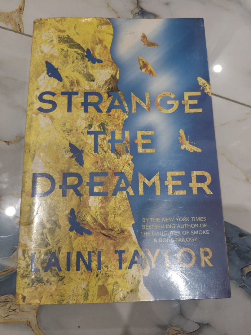 Strange The Dreamer by Laini Taylor (Category: Storybooks) located in Cavite. Submitted by jannede (Listing ID 1461512844, Image 1). Description: self painted edges paperback.