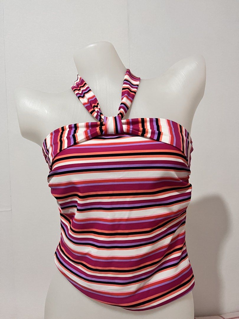 Striped Halter Neck Swimsuit Top (Category: Bikinis & Swimsuits) located in Manila. Submitted by chimcheese (Listing ID 1461328918, Image 1). Description: - Cute striped halter neck swimsuit top - Vibrant mix of pink, purple, white, black, and orange stripes - Fabric has a nice stretch - Halter ties at the neck with a knot detail - Great for the beach or pool.