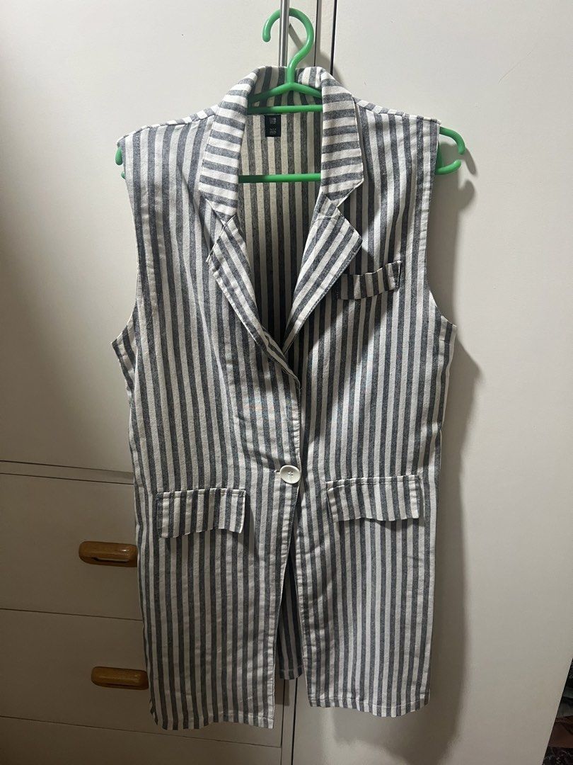 Striped Sleeveless Blazer Vest (Category: Coats, Jackets and Outerwear) located in Calamba. Submitted by cdg02 (Listing ID 1461449818, Image 1). Description: - Grey and white striped sleeveless blazer vest - Single button closure at the front - Two flap pockets on the front - Lapel collar - Length: 33 inches.