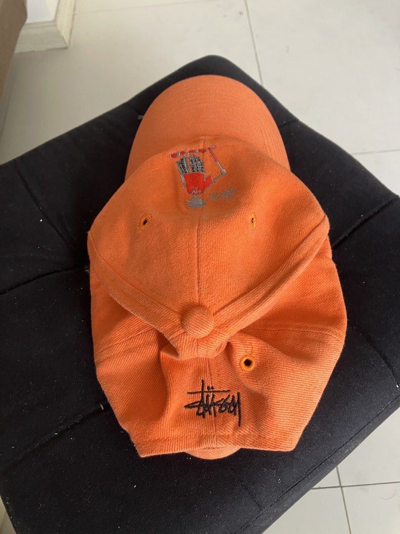 Stussy Orange Cap with Embroidered Graphic (Category: Caps & Hats) located in Paranaque City. Submitted by flipflop.fones (Listing ID 1461447699, Image 2). Description: - Iconic Stussy baseball cap - Features a cool embroidered graphic on the front - Stussy logo embroidered on the back - Classic, comfortable fit - Ideal for sunny weather and everyday wear.