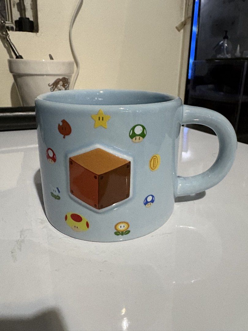 Super mario embossed mug (Category: Coffee & Tea Tableware) located in Caloocan City. Submitted by rabbithole2026 (Listing ID 1461341796, Image 1). Description: .