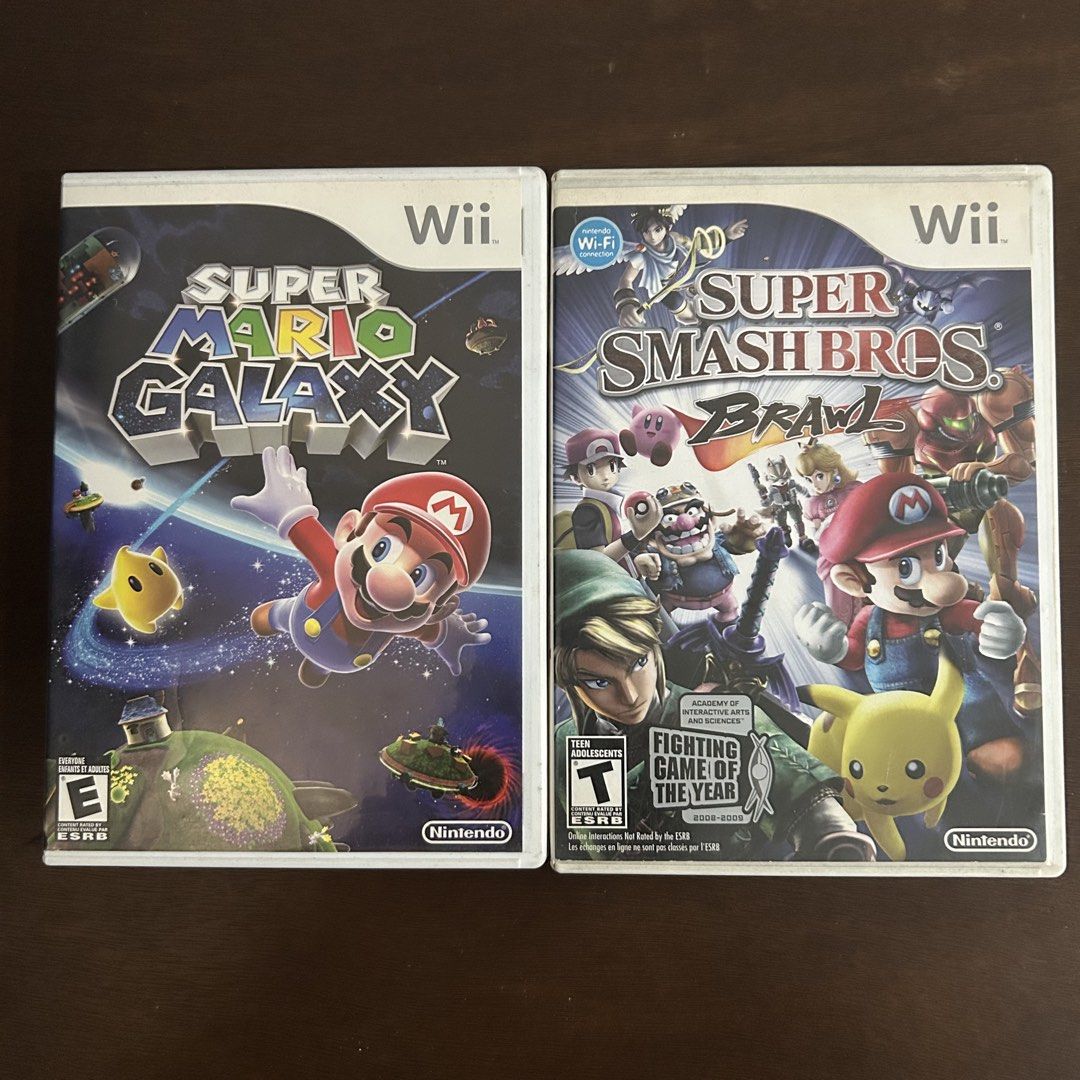 Super Mario Galaxy & Super Smash Brawl Bundle Wii (Category: Nintendo) located in Quezon City. Submitted by argamenest (Listing ID 1461385329, Image 1). Description: - tested and working - take all only for 1500 📍 Fairview Quezon City.