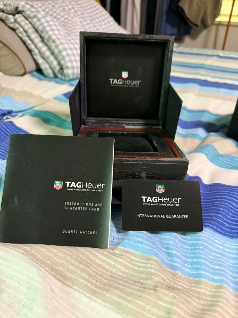 TAG Heuer Aquaracer Quartz Watch (Category: Luxury Watches) located in Caloocan City. Submitted by dave235 (Listing ID 1461465713, Image 2). Description: - Authentic TAG Heuer Aquaracer Watch - Sleek Black Dial with Date Window - Durable Stainless Steel Bracelet - Water Resistant up to 300 Meters - Scratch-Resistant Sapphire Crystal - Swiss Made Quality (Since 1860) - First Owner - Comes with Original Box, Instructions, and International Guarante