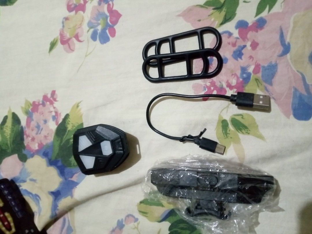 Tail Light with Signal Light (Category: Bicycles) located in Manila. Submitted by shopwithrye (Listing ID 1461363554, Image 2). Description: From ₱296 > ₱150 - Tail light with signal light - Good for signalling - Remote, cord, and lock rubber included P.S. Have a defect. Hazard mode is not working but all the other signals are good..