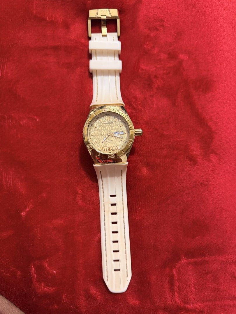 TechnoMarine Cruise Monogram Gold Dial Preloved Watch (Category: Women's Watches) located in Bulacan. Submitted by meandmylvonlineshop (Listing ID 1461558814, Image 2). Description: - Preloved TechnoMarine Watch - Gold-tone case - Textured dial with monogram pattern - Day and date display - Genuine beige/white silicone strap - Water resistant up to 200 meters - No original box or papers included.
