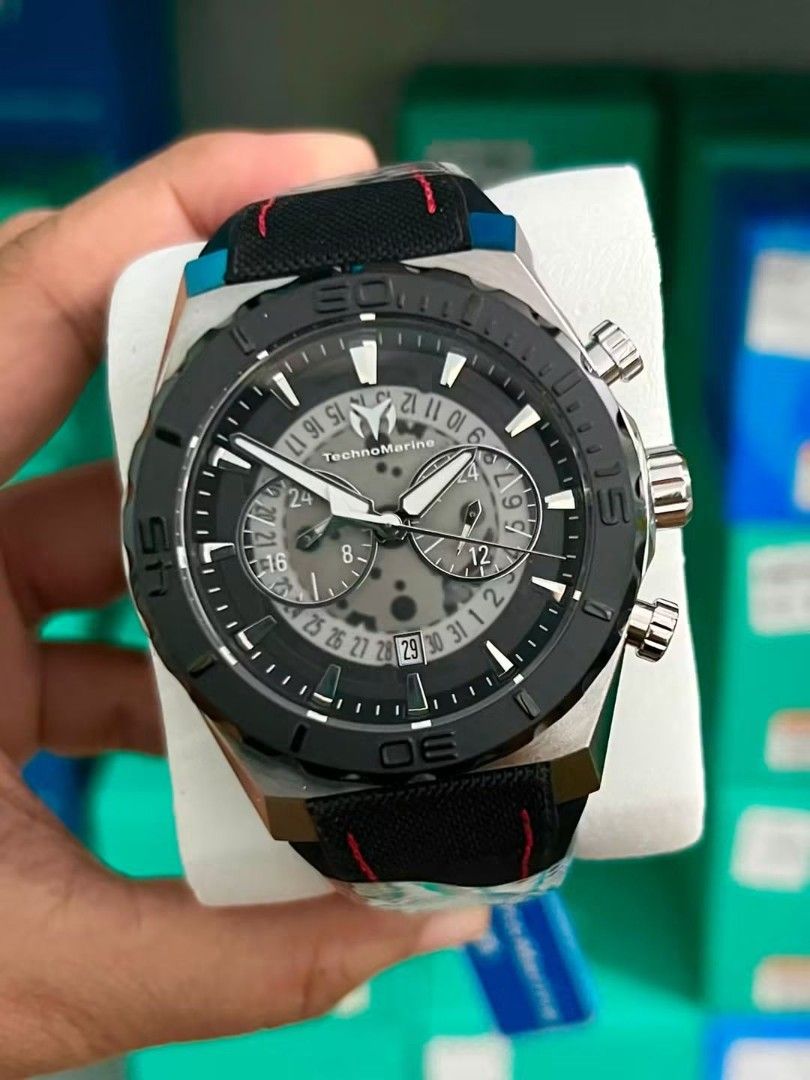 Technomarine TM-519006 Reef Shark ( 48mm diameter ) (Category: Men's Watches) located in Las Pinas. Submitted by luxlahvu2017 (Listing ID 1461456798, Image 1). Description: - TechnoMarine Chronograph Watch - Black dial with silver accents - Multiple subdials for added functionality - Convenient date window - Black fabric strap with stylish red stitching.
