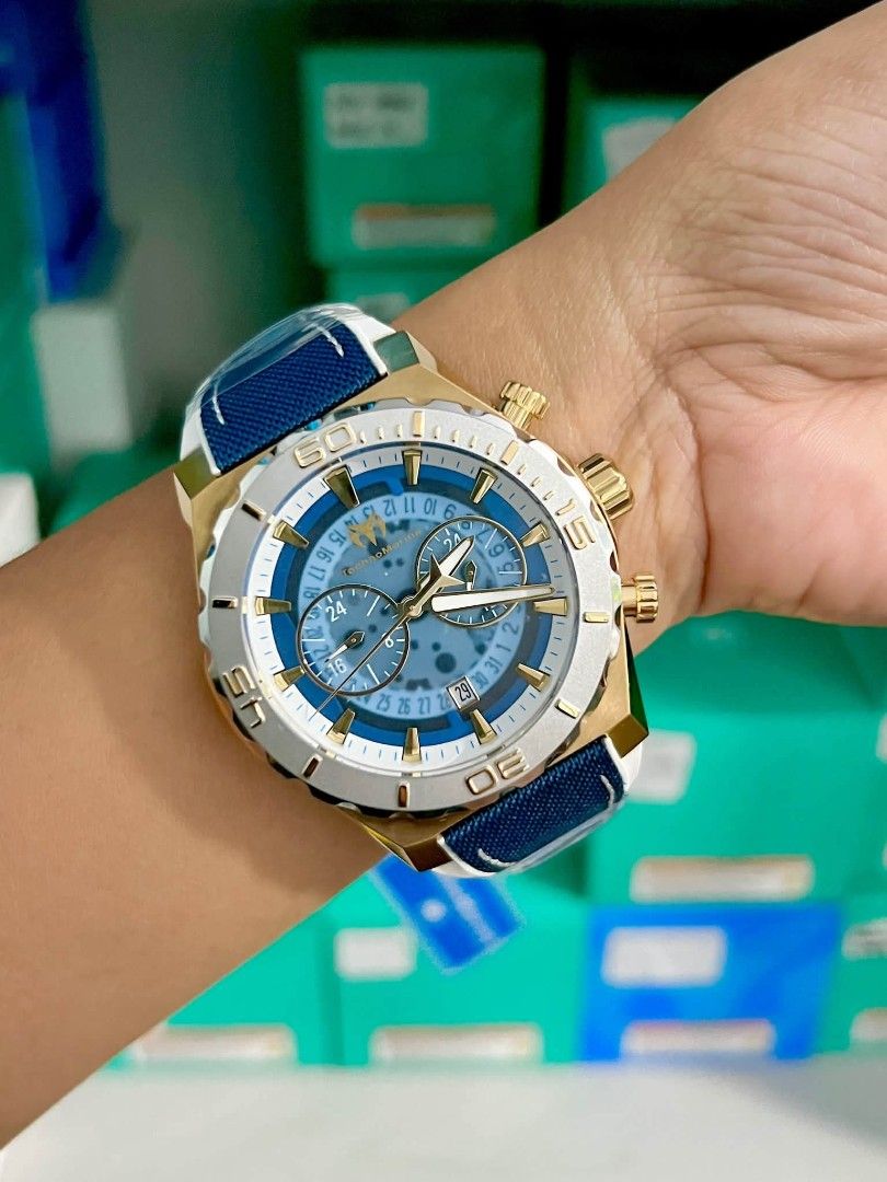 Technomarine TM-519007 Reef Shark ( 48mm diameter ) (Category: Women's Watches) located in Las Pinas. Submitted by luxlahvu2017 (Listing ID 1461456621, Image 2). Description: - Brand: TechnoMarine - Dial Color: Blue with gold accents - Features: Chronograph function - Strap: Blue and white - Style: Versatile, suitable for casual and dressy occasions - Condition: Looks great on the wrist.