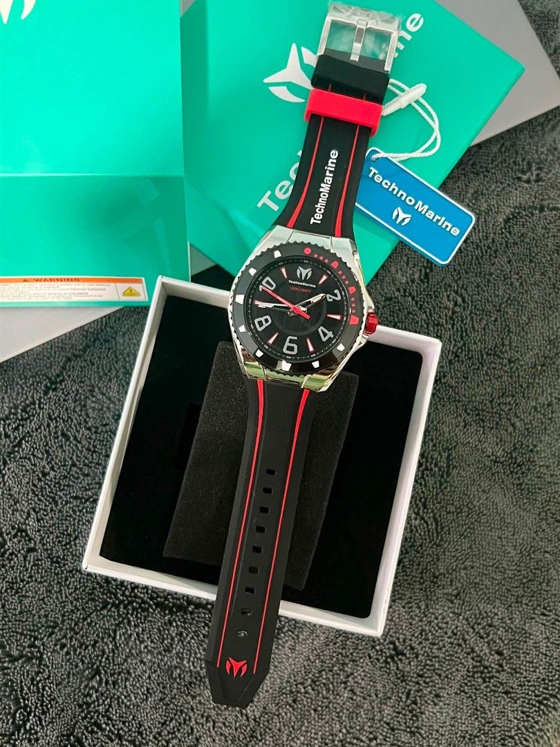 TechnoMarine TM-525014 Racing Legends ( 44mm diameter ) (Category: Women's Watches) located in Las Pinas. Submitted by luxlahvu2017 (Listing ID 1461447836, Image 1). Description: - Cool TechnoMarine watch - Black dial with striking red accents - Durable black silicone strap with red trim and TechnoMarine branding - Comes with original box and tag - Ideal for everyday wear and sports activities.