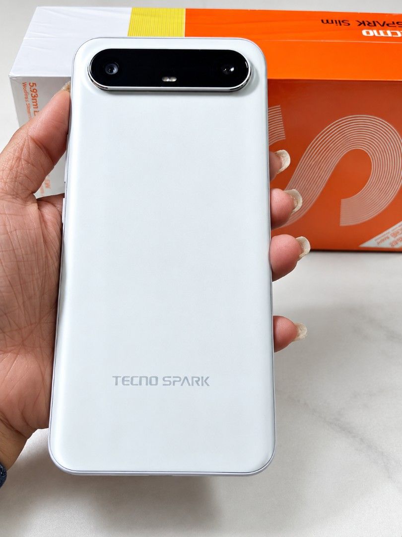 Tecno Spark Slim 256 + 8 gb (Category: Android Others) located in Bulacan. Submitted by adorablejemz (Listing ID 1461453084, Image 3). Description: This is my secondary phone. Unused charger. Box still in plastic. Honest issue: A few hairline scratches on the but barely noticeable. I left it in my hand bag a couple of times without a screen protector. This is so light I promise. Favorite ko siya hawakan at gamitin for social media purposes. The m
