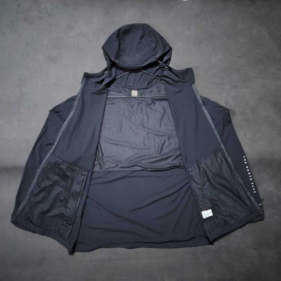 The North Face compact windbreaker (Category: Coats, Jackets and Outerwear) located in General Santos City (Dadiangas). Submitted by angelodemegilloceballos (Listing ID 1461520218, Image 2). Description: - Brand: The North Face - Color: Black - Style: Hooded Jacket - Features: Lightweight, full zip closure, two front pockets, mesh lining for breathability - Ideal for: Windy days and outdoor activities - Branding: Logo on chest and sleeve.