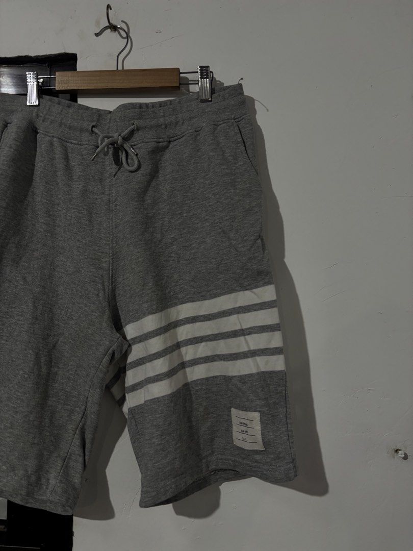 THOM BROWNE AUTHENTIC SIGNATURE 4BAR GRAY SHORTS (Category: Luxury Apparel) located in Naga. Submitted by hubthrift2 (Listing ID 1461337606, Image 2). Description: THOM BROWNE WAIST-30.5 up to 40 LENGTH-20.5 LEG HOLE-11 LIKE NEW CONDITION NO ISSUE NEED WASH ONLY COLOR RATE-10/10.
