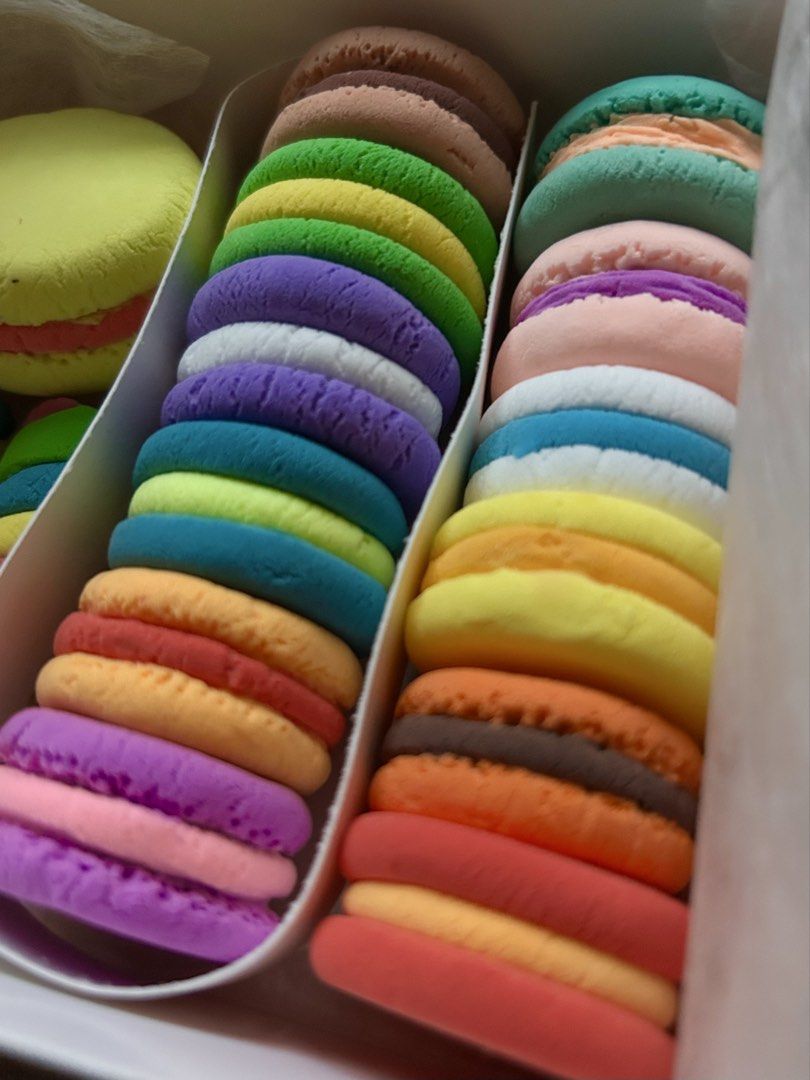 A Box of Tiny Macarons made from Soft Light Clay (Category: Handmade Craft) located in Quezon City. Submitted by hygge.elements (Listing ID 1461442229, Image 1). Description: A box of tiny macarons / miniature sweets out of super light clay. Realistic little treats that lasts longer. Can also be an added decor in your coffee table or a sweet little gift. Gift- ready and comes with a purple ribbon. 💕 - 2 Boxes left.