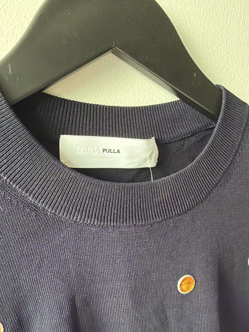TOGA PULLA Navy Sweater with Orange Dot Pattern (Category: Coats, Jackets and Outerwear) located in Makati City. Submitted by cheapipie (Listing ID 1461418291, Image 2). Description: - Navy blue sweater from TOGA PULLA very chic and comfortably light . - Features a repeating orange dot pattern all over - Crew neck, long sleeves - Ribbed cuffs and hem - Versatile for layering or wearing solo.