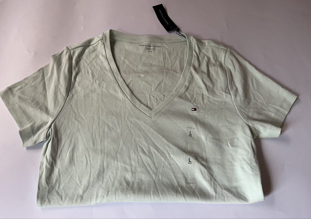 Tommy Hilfiger Vneck Shirt (Category: Shirts) located in Santa Rosa. Submitted by ninaparis (Listing ID 1461404188, Image 3). Description: Original Tommy Hilfiger Vneck Tshirt size Large can fit to Medium size cotton stretch.