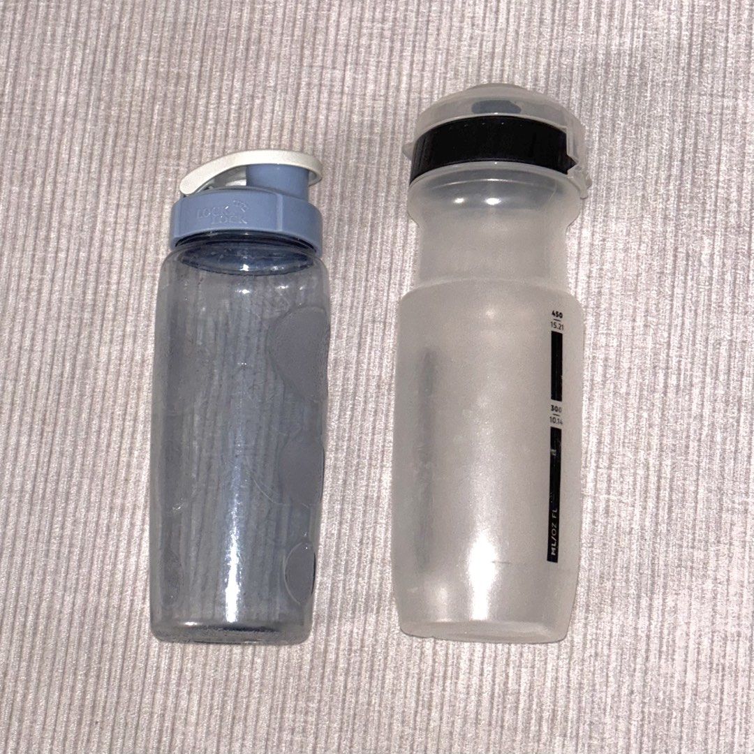 Two (2) Water Bottles (Category: Water Bottles & Tumblers) located in Makati City. Submitted by nicomachus (Listing ID 1461330115, Image 1). Description: (1) Aptonia (650ml squeeze bottle) = Php 100 (2) Lock & Lock (500ml hard bottle) = Php 150 <note: flip lock already a bit flimsy but still works> Buy both for only Php 190..