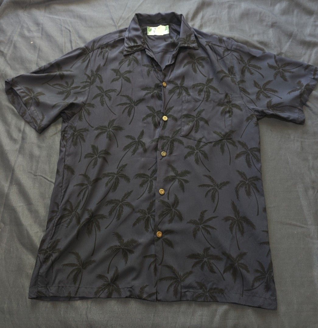 Two Palms Hawaiian Shirt (Category: Tshirts & Polo Shirts ) located in Batangas. Submitted by retroguyy (Listing ID 1461353482, Image 1). Description: Two Palms Hawaiian Shirt Chest (Pit) = 19 inch Length= 28 inch Made in Hawaii Material = Rayon.