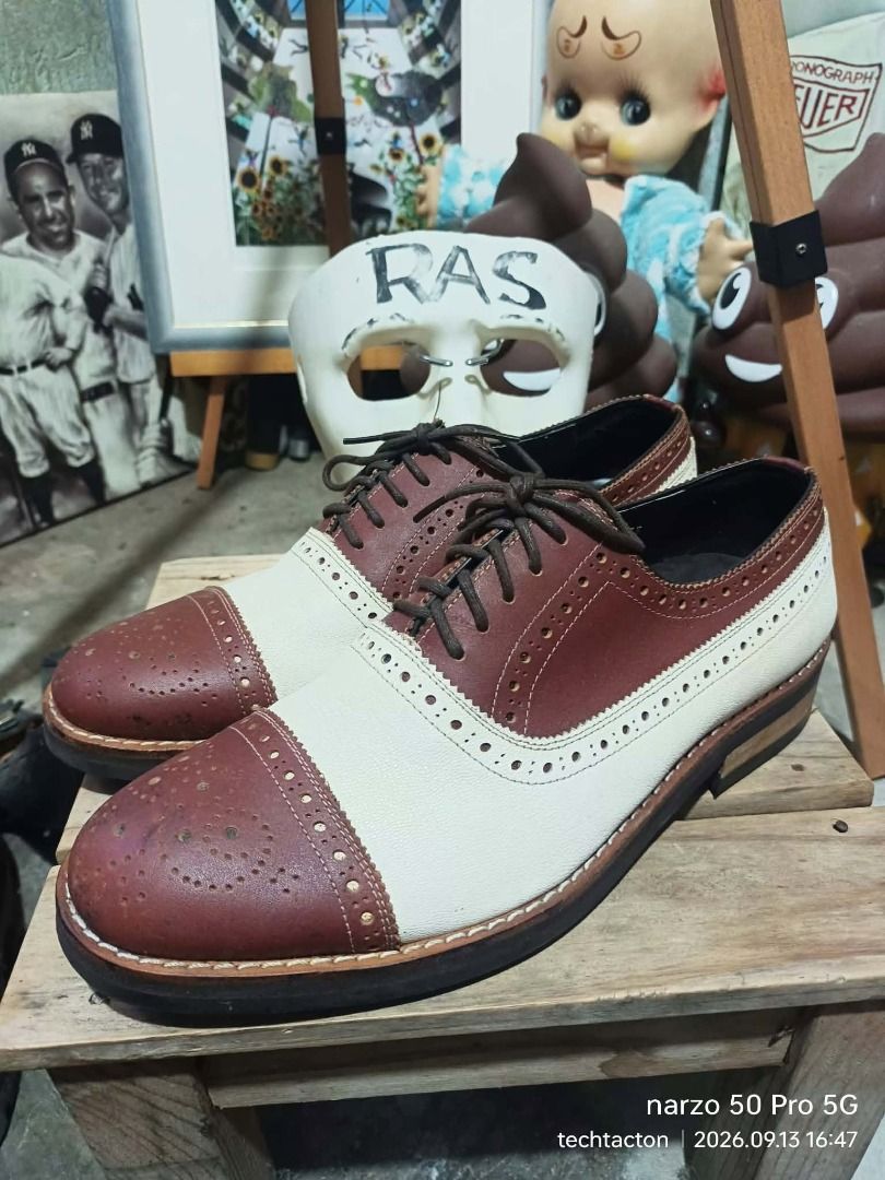 Two-Tone Leather Wingtip Brogues Oxfords (Category: Dress Shoes) located in Santo Tomas. Submitted by pickers_corner (Listing ID 1457176807, Image 1). Description: JOSHUA Hommie Scotch Grain two-tone wingtip spectator oxford dress shoes size M on tav actual insole 26cm very good condition minimal issue - Classic two-tone wingtip brogues - Combination of brown leather and cream suede - Features perforated details throughout - Secure lace-up closur
