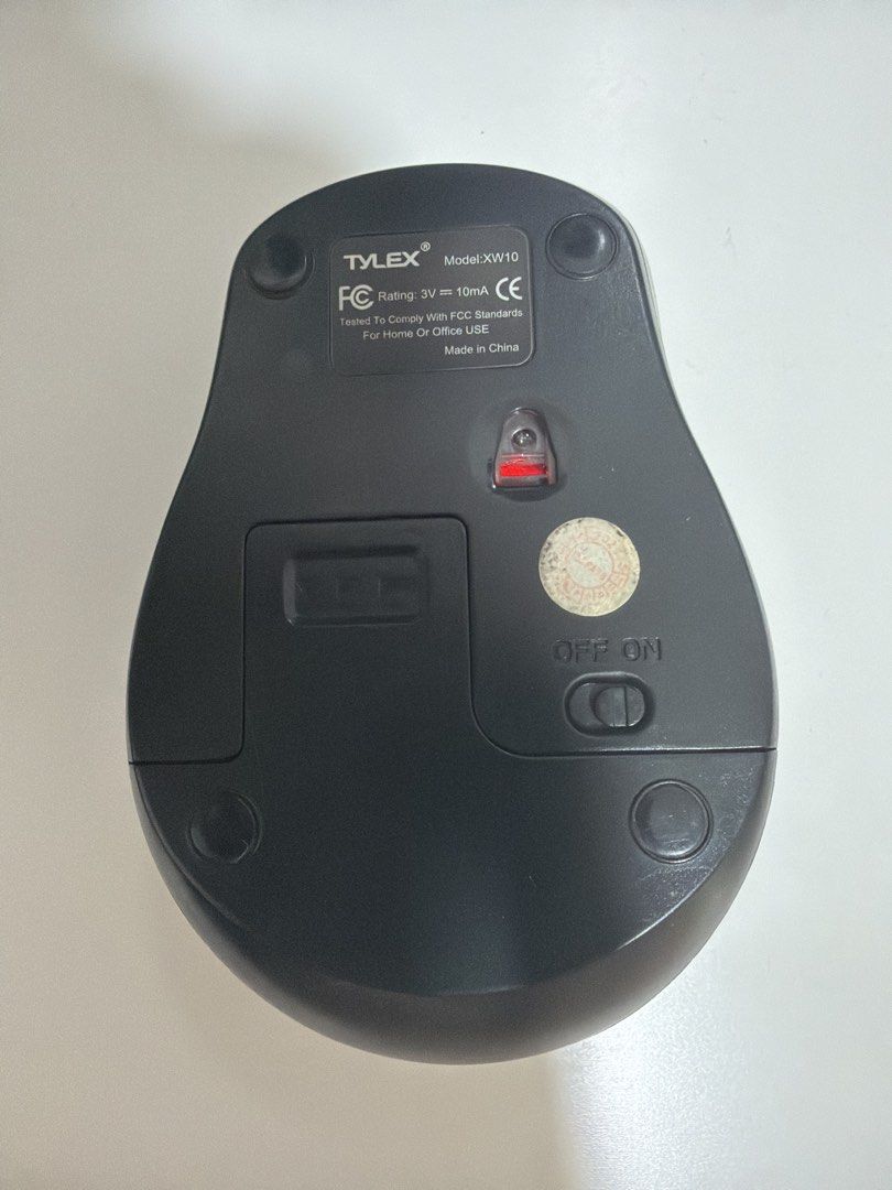 TYLEX XW10 Wireless Optical Mouse (Category: Mouse & Mousepads) located in Manila. Submitted by heyannie0415 (Listing ID 1461561194, Image 2). Description: - TYLEX XW10 Wireless Optical Mouse - Color: Black - Connectivity: 2.4GHz Wireless Technology - Compliance: Tested to comply with FCC standards - Ideal for: Home or Office use - Power: Requires 2x AAA batteries (not included) - Features: On/off switch at the bottom.