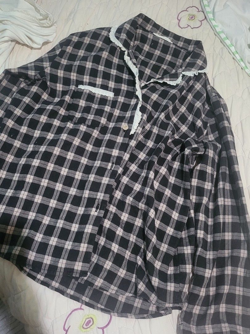 ULLALA Plaid Pajama Set with Lace Trim (Category: Undergarments & Loungewear) located in Manila. Submitted by calmmountain.887b60 (Listing ID 1461334997, Image 2). Description: - Brand: ULLALA - Style: Plaid Pajama Set - Top: Button-up with delicate lace trim - Bottoms: Matching pants included - Material: Soft and comfortable fabric - Perfect for: Lounging at home and cozy nights.