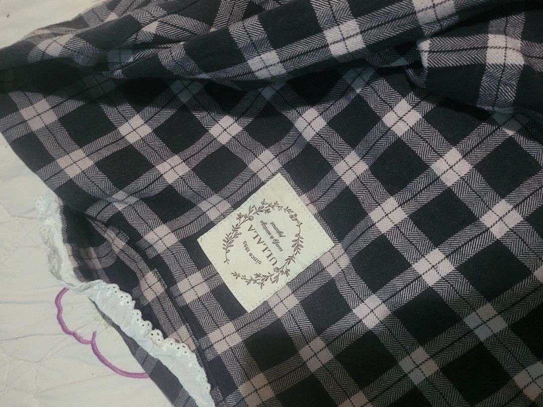 ULLALA Plaid Pajama Set with Lace Trim (Category: Undergarments & Loungewear) located in Manila. Submitted by calmmountain.887b60 (Listing ID 1461334997, Image 3). Description: - Brand: ULLALA - Style: Plaid Pajama Set - Top: Button-up with delicate lace trim - Bottoms: Matching pants included - Material: Soft and comfortable fabric - Perfect for: Lounging at home and cozy nights.