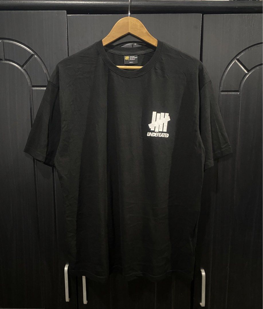 Undefeated - Logo Shirt (Category: Tshirts & Polo Shirts ) located in Naga. Submitted by junked_garments_v2 (Listing ID 1461514998, Image 1). Description: Undefeated - Logo Shirt Excellent Condition NoIssue Need Wash Width 23” / Length 29” Dm me to purchase!.