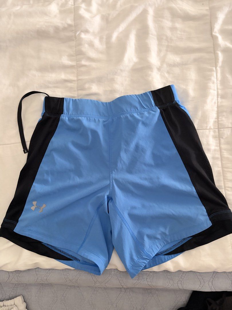 Under Armour Blue & Black Athletic Shorts (Category: Shorts) located in Paranaque City. Submitted by rafadg (Listing ID 1461461291, Image 1). Description: - Running shorts - Fits 30-32in waist.