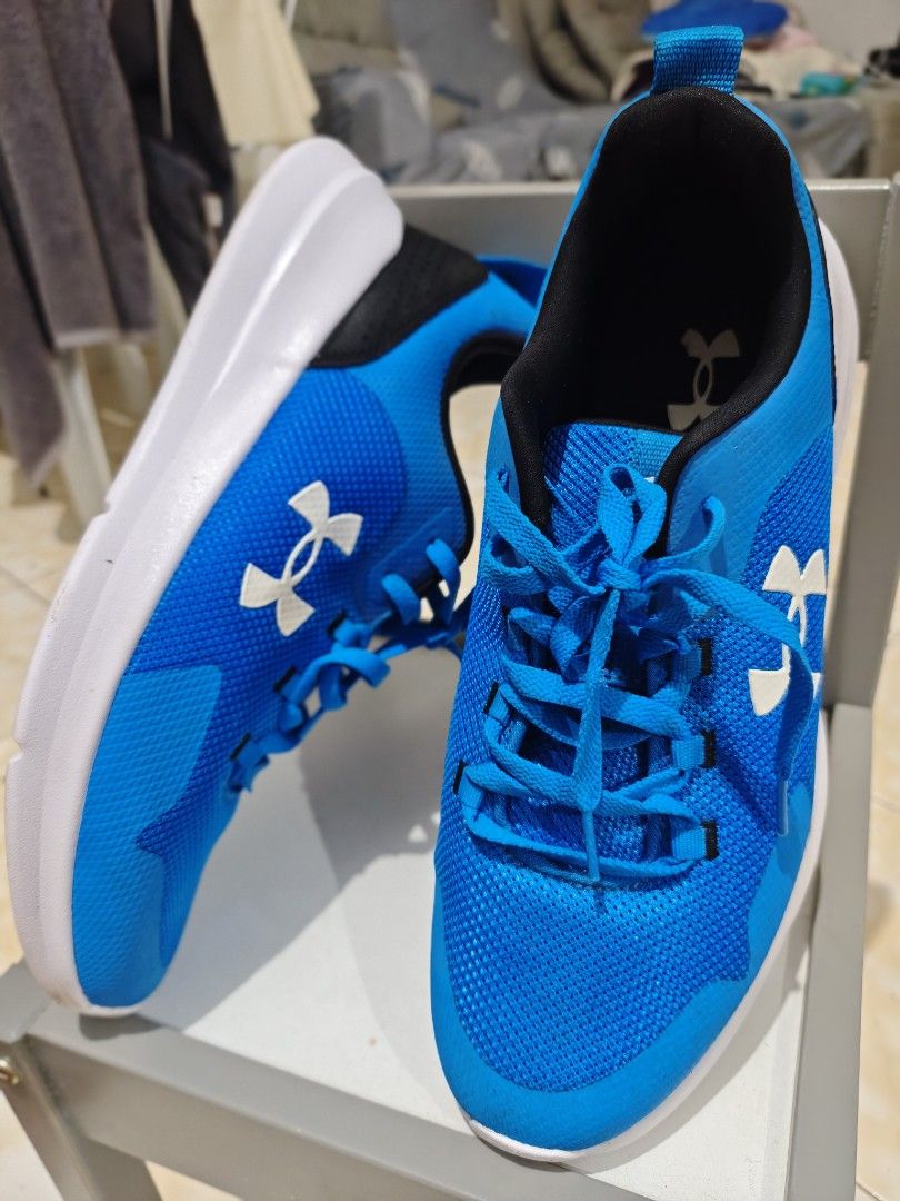 Under Armour Blue Running Shoes (Category: Casual Shoes) located in Bacoor. Submitted by louie069 (Listing ID 1461498853, Image 3). Description: For Sale Under Armour Running Shoes Size 12 US Used less than 5x Great Condition 8.5-9/10 No sole sep Slightly drag heel ❌ No Box PM for other details - Blue Under Armour running shoes - Breathable mesh upper - White sole - Lace-up closure - Perfect for workouts or casual wear - Comfortable and stylish.