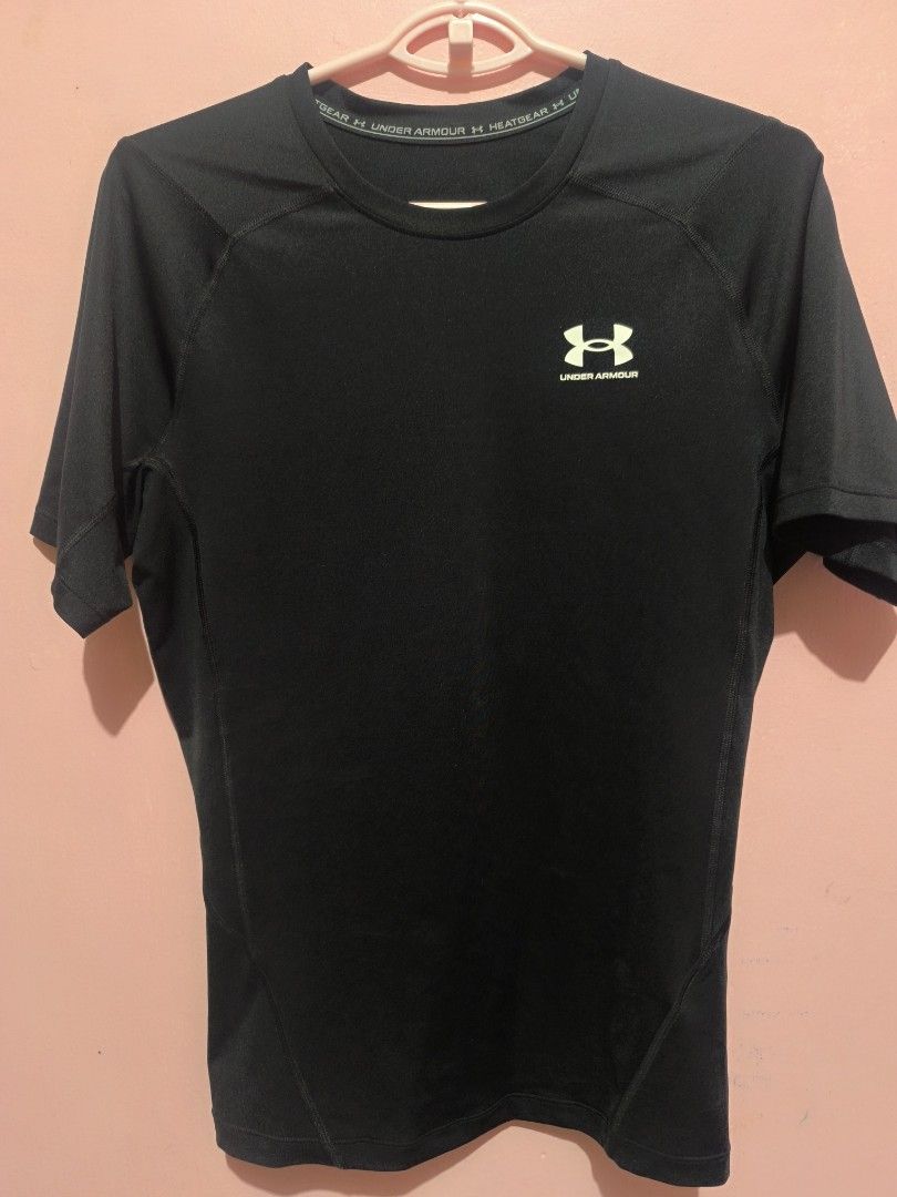 Under Armour Compression Shirt (Category: Activewear) located in Gumaca. Submitted by badzmdfghjkl (Listing ID 1461506201, Image 1). Description: like new excellent condition XL on tag but fits M-L rfs; downsizing.