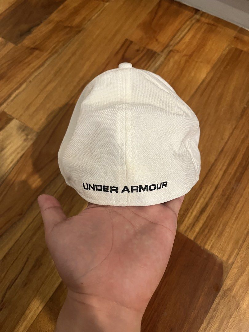 Under Armour UA Classic Fit White Cap (Category: Caps & Hats) located in Manila. Submitted by yabai30 (Listing ID 1461480501, Image 2). Description: - White Under Armour Cap - UA Classic Fit - Size XL - Ideal for Sports or Casual Wear - Features Under Armour Logo on Front - Made in Vietnam.