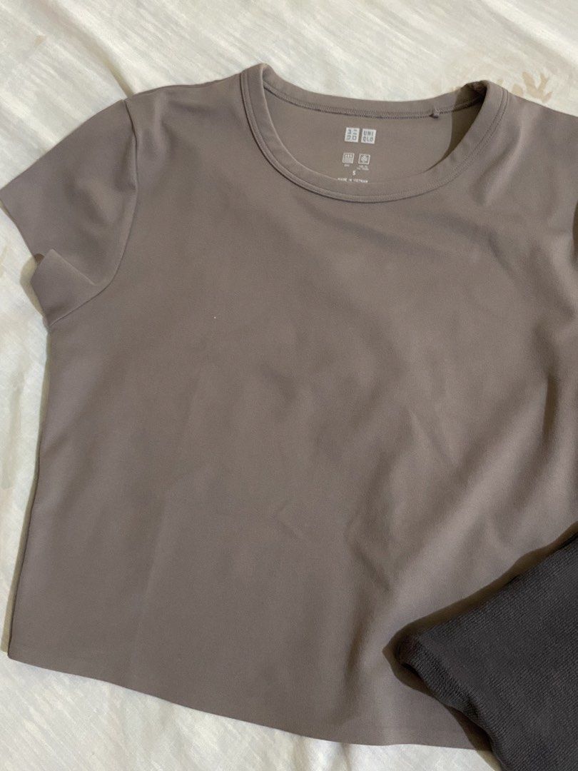 Uniqlo & FB Sister T-shirts Bundle (Category: Shirts) located in Candelaria. Submitted by xiao_z (Listing ID 1461336828, Image 2). Description: - Bundle of 2 t-shirts - Uniqlo Taupe T-shirt: Size S, 'Cool to the Touch' fabric - FB Sister Dark Grey T-shirt: Size XS, ribbed texture, small embroidered bow detail - Great for everyday wear.
