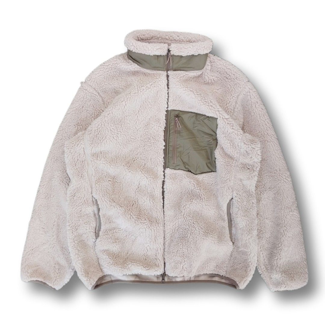 Uniqlo Fleece Zip-Up Jacket (Category: Coats, Jackets and Outerwear) located in Cavite. Submitted by spinfits (Listing ID 1461354405, Image 1). Description: - Super cozy cream fleece jacket - Olive green chest pocket with zipper - Two side pockets - Contrasting trim on collar and cuffs - Ideal for layering - Features a YKK zipper Size: L-XL (Width: 25") (Lenght: 29") INCHES Condition: (Lightly used) Color rate: 9/10 Issues: None 📩 DM for more in