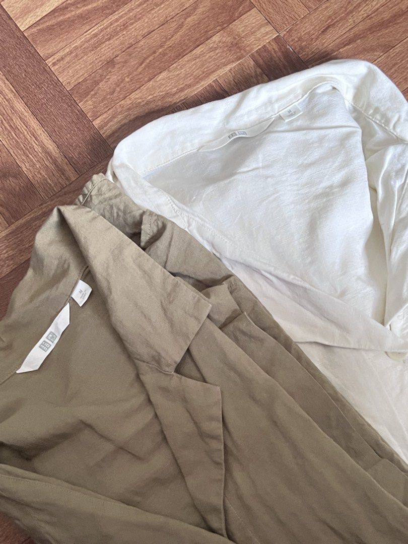 Uniqlo linen blen open collar (Category: Blouses) located in Malabon City. Submitted by _itsmejrmn (Listing ID 1461369654, Image 3). Description: 1200 for take all (No Issue, no stain) 650 each Olive green and off white. Size: medium (m-L runs big) Rfs: decluttering only. Used twice each blouse Malabon loaction.