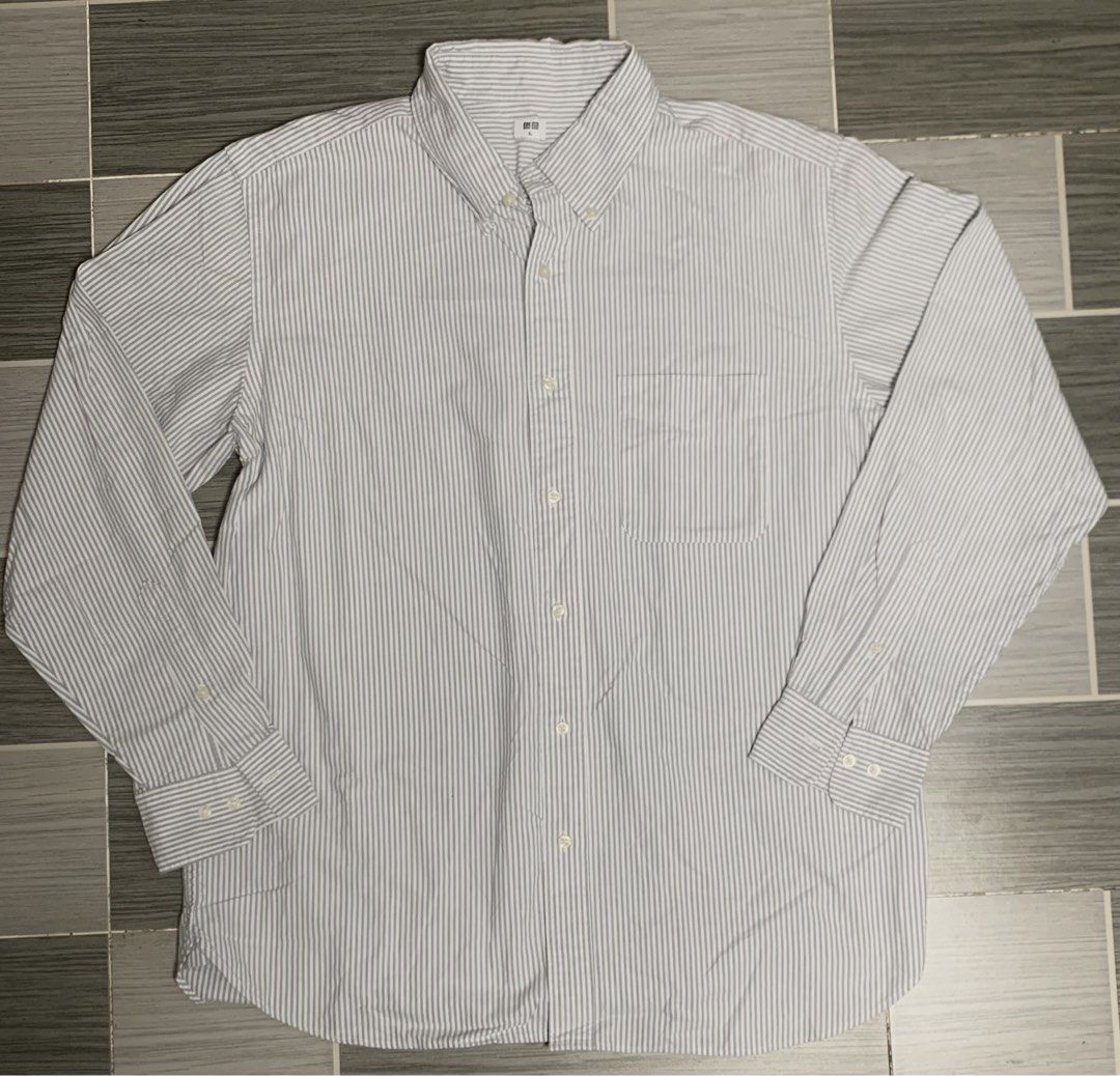 Uniqlo long-sleeve button-up shirt (Category: Formal Shirts) located in Manila. Submitted by marvzz088 (Listing ID 1461478732, Image 1). Description: .