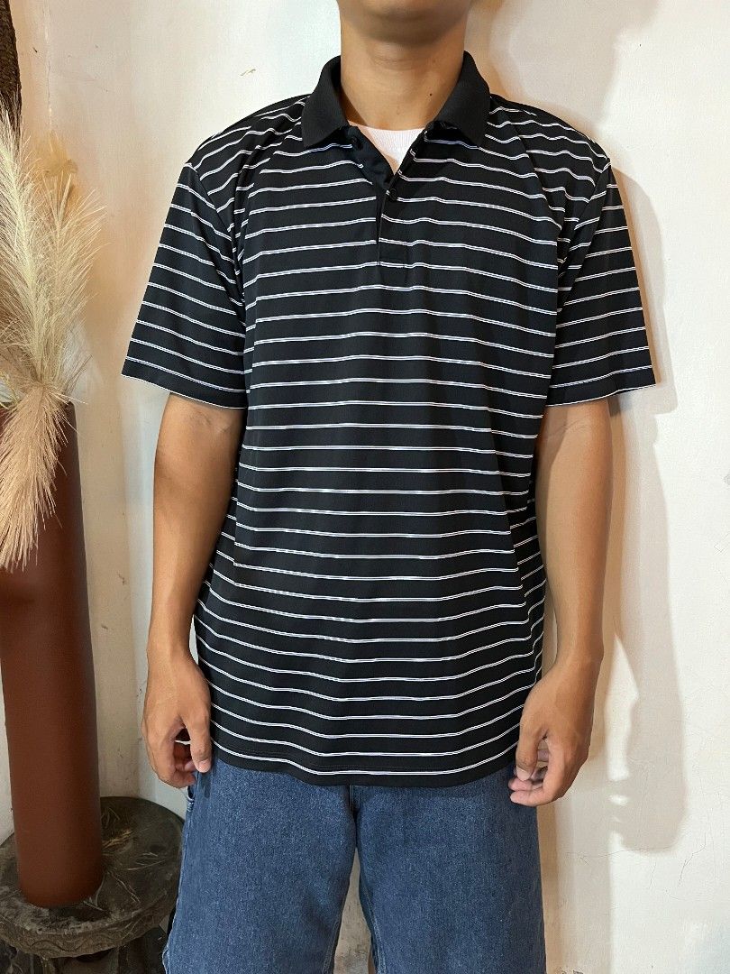 Uniqlo polo (Category: Tshirts & Polo Shirts ) located in Cabuyao City. Submitted by grand_vault (Listing ID 1461482199, Image 2). Description: Uniqlo Stripes Polo Size: XL Width: 22 Length: 27 Condition: 10/10 Color rate: 10/10 Issue: None.