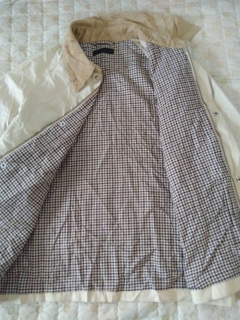 Uniqlo Utility Blouson Jacket In Beige Large (Category: Coats, Jackets and Outerwear) located in Zamboanga. Submitted by nurbya898048 (Listing ID 1461389277, Image 3). Description: Uniqlo Utility Blouson jacket. Features a corduroy collar and a checkered lining. Zip-up front with button closure. Two front pockets. Classic Harrington style. Great for layering. Tag size large Dimes 24.5x26 Beige color way Excellent to as new Color rate 10/10 Check 