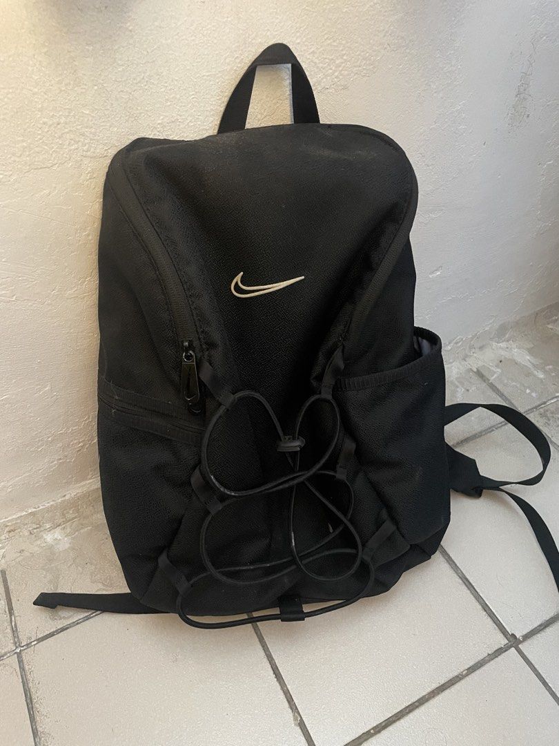 UNISEX nike black backpack (Category: Backpacks) located in Pasay City. Submitted by lastwrods (Listing ID 1461559338, Image 1). Description: - i used it during HS, never used again - a little dirty but can be removed - unisex - has compartments for laptop/ipad etc - good condition - bought in a diff country pa message for more !.