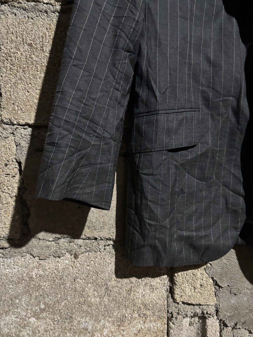 United Arrows Tokyo Pinstripes Wool Blazer (Category: Coats, Jackets and Outerwear) located in Tagbilaran City. Submitted by noeeeelll (Listing ID 1461545649, Image 3). Description: - Dark grey blazer with subtle pinstripes - Single button closure - Two front pockets - Fully lined interior - Ideal for formal or semi-formal occasions - Sharp and professional look - Made in Japan - In excellent condition w.