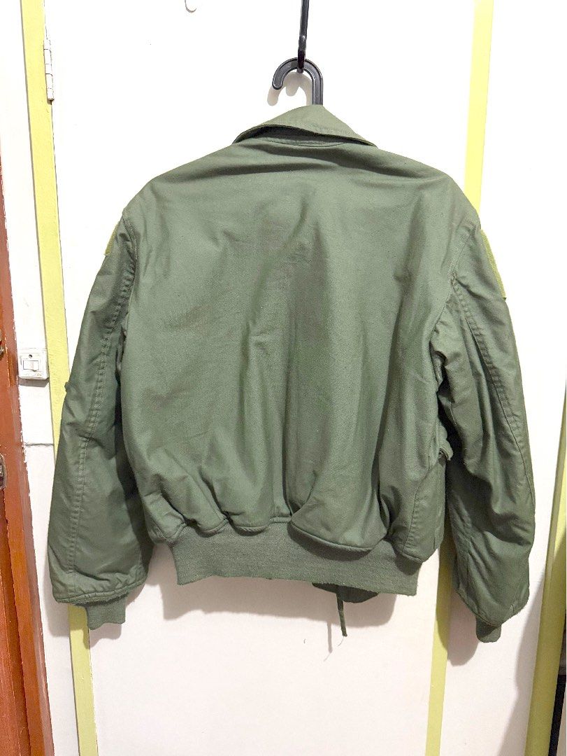US Air Force CWU 45/P Flight bomber Jacket USGI Cold Weather Medium (Category: Coats, Jackets and Outerwear) located in Manila. Submitted by x79g4mhysy54219 (Listing ID 1461455760, Image 3). Description: - US Air Force CWU 45/p Flight Jacket - Size: Medium - Color: Olive Green - Cold Weather Gear - Made of Fire-Resistant Material - Classic Bomber Style - Ideal for Collectors - Care: Dry Clean Only (No Starch/Ironing Needed).